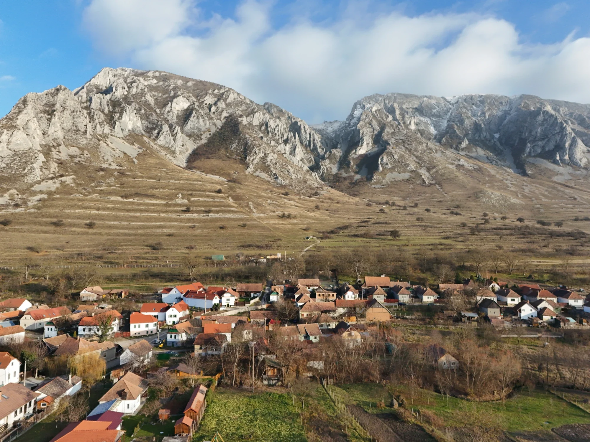 Piatra Secuiului above Rimetea village in winter, Trascău Mountains, Transylvania, Romania